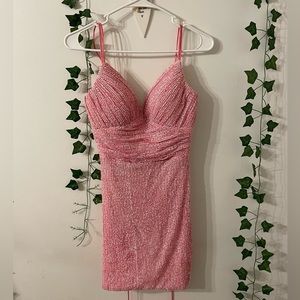 Pink size 4 dress, padding in the breast area, lace up back.